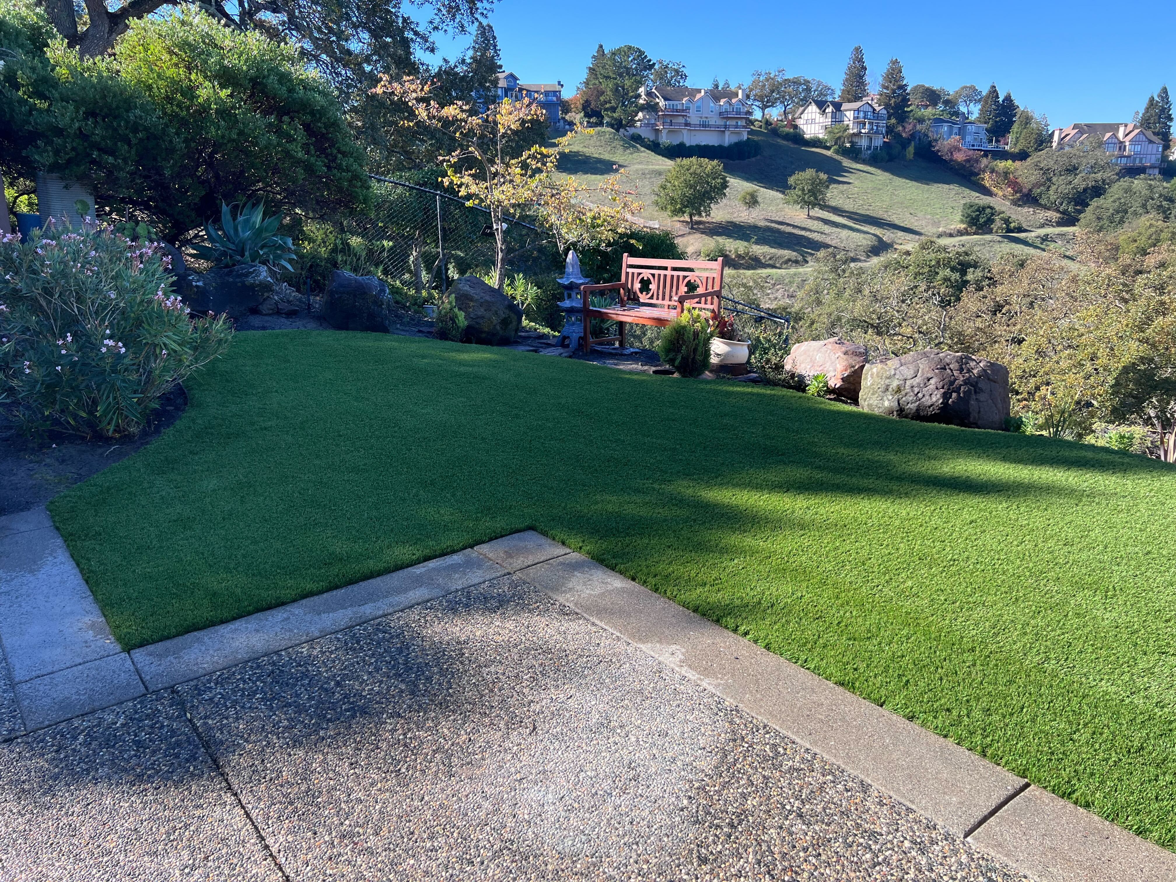 fg-pavers-and-turf-alamo-turf-installations-after-05.jpg Turf detail with hillside backdrop—Alamo.