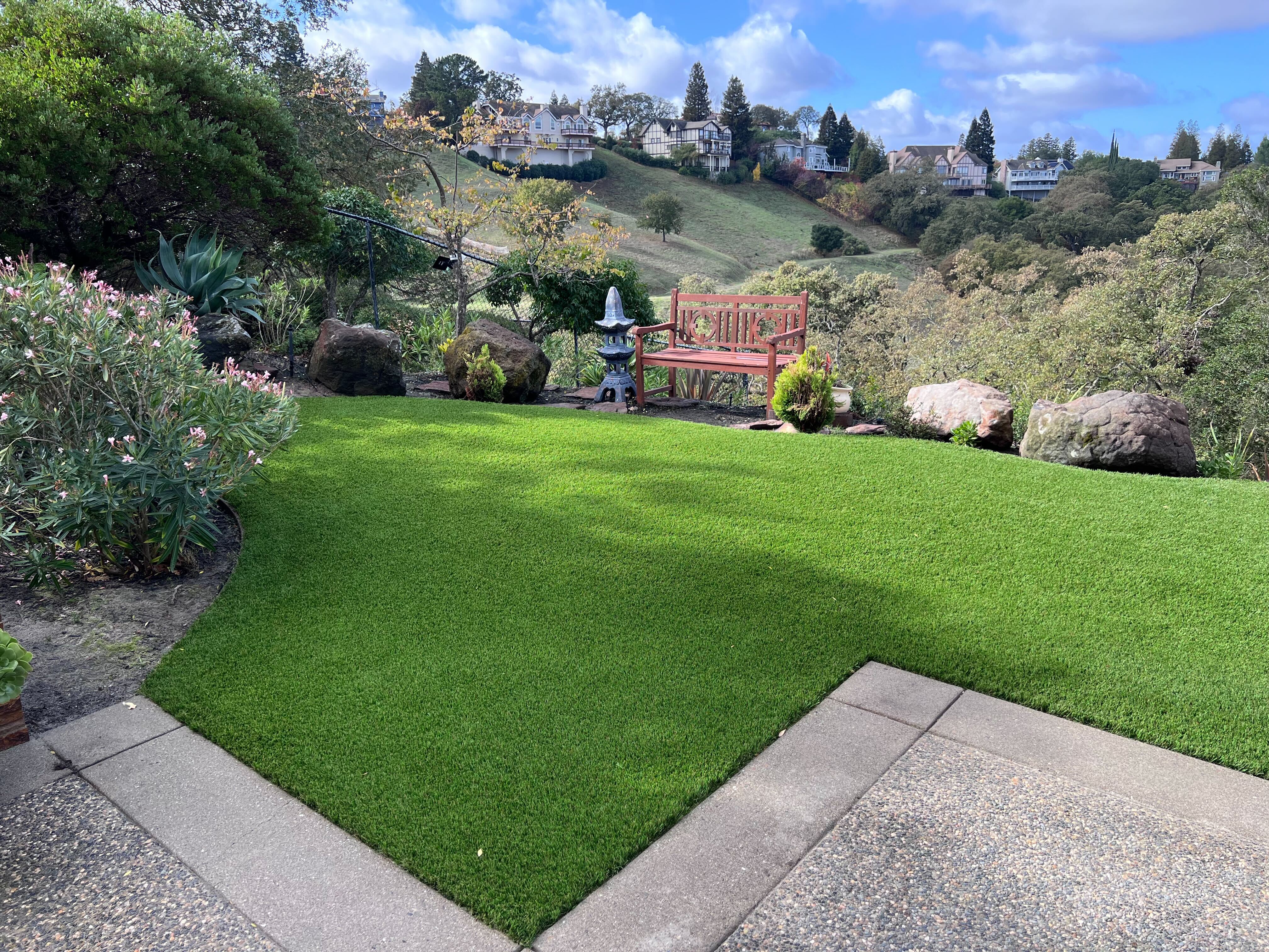 fg-pavers-and-turf-alamo-turf-installations-after-12.jpg Synthetic turf with perimeter edging—Alamo project.