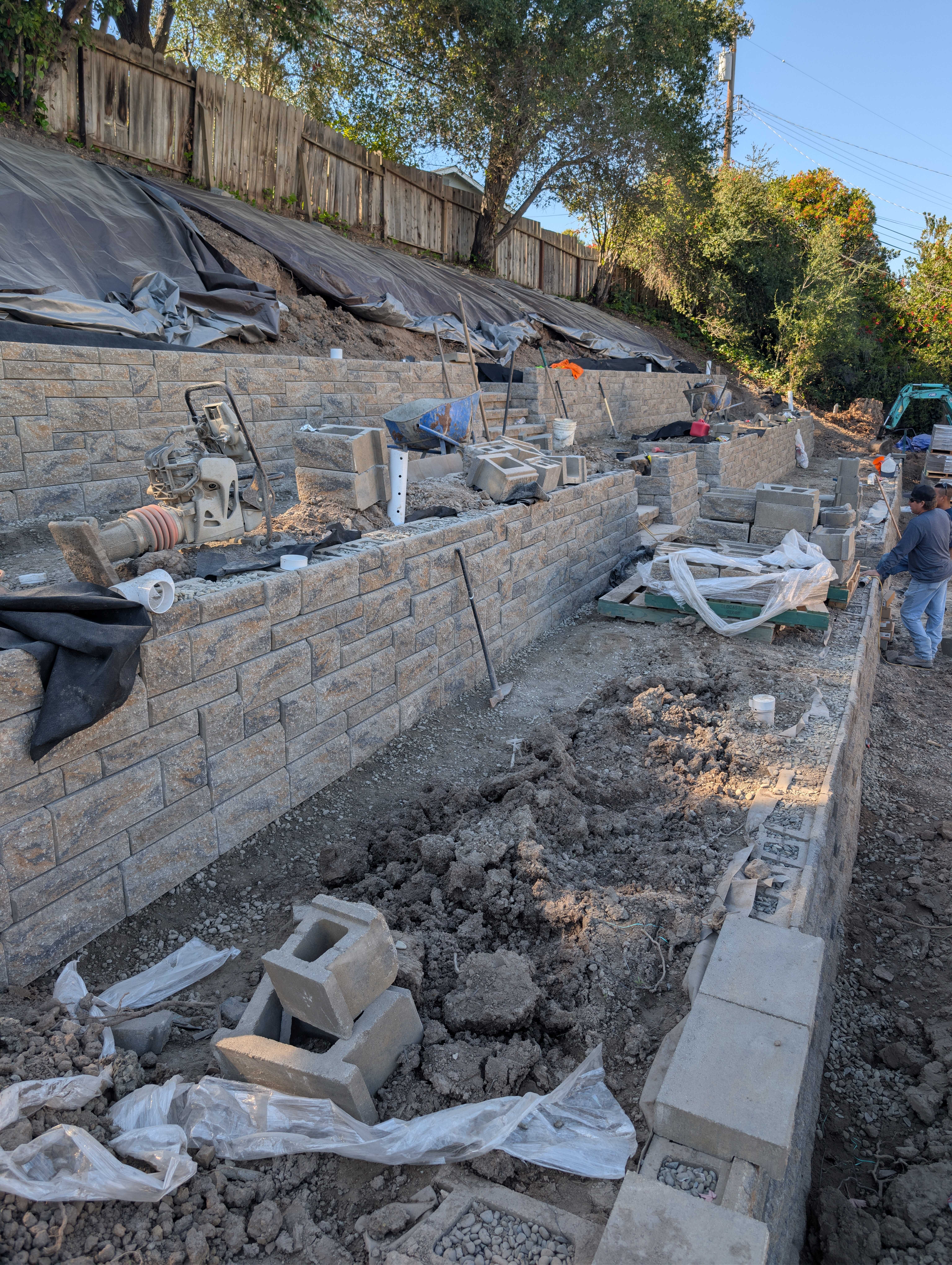 fg-pavers-and-turf-san-jose-retaining-walls-pavers-lighting-progress-106.jpg Tiered retaining structure progress—daylight photo.