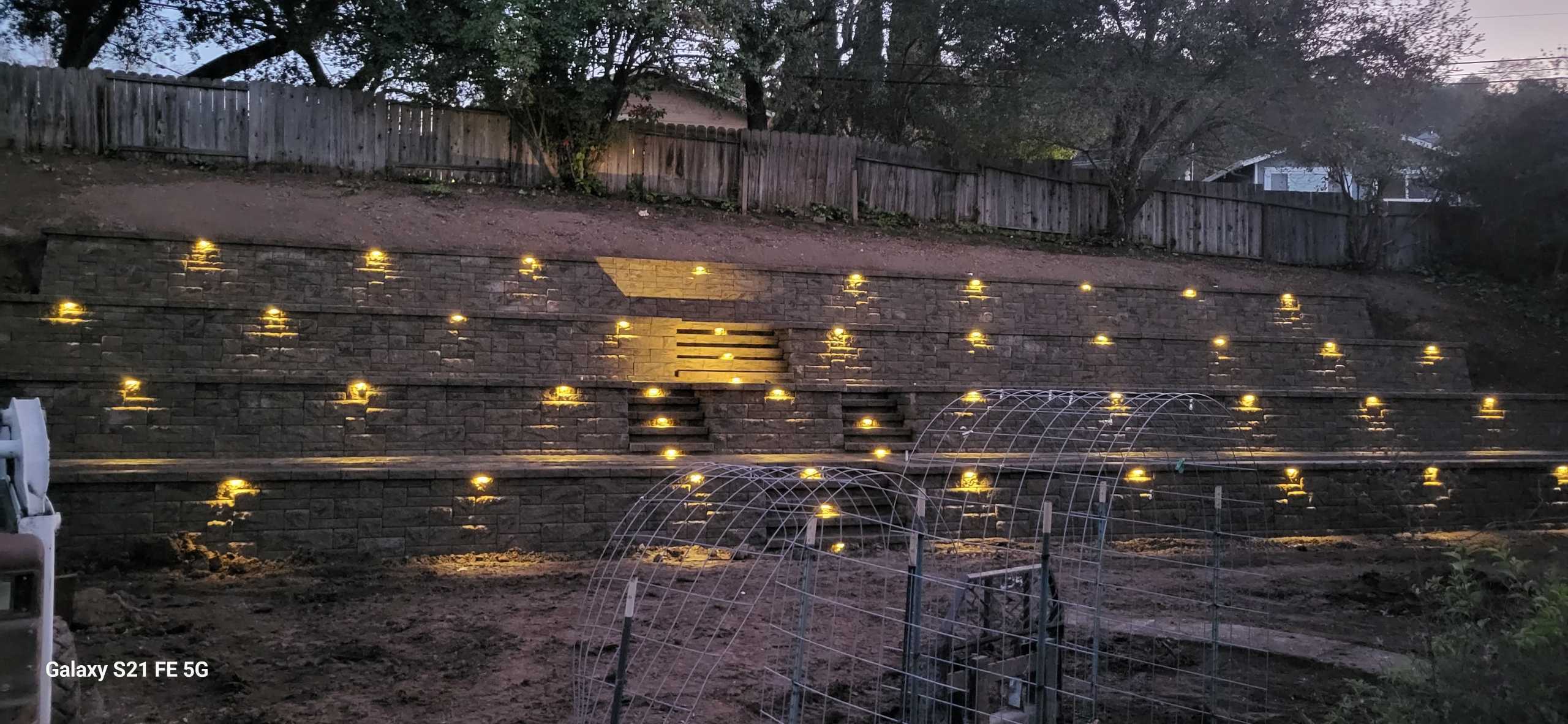 fg-pavers-and-turf-san-jose-retaining-walls-pavers-lighting-progress-156.jpg Evening terrace and path area—progress view.