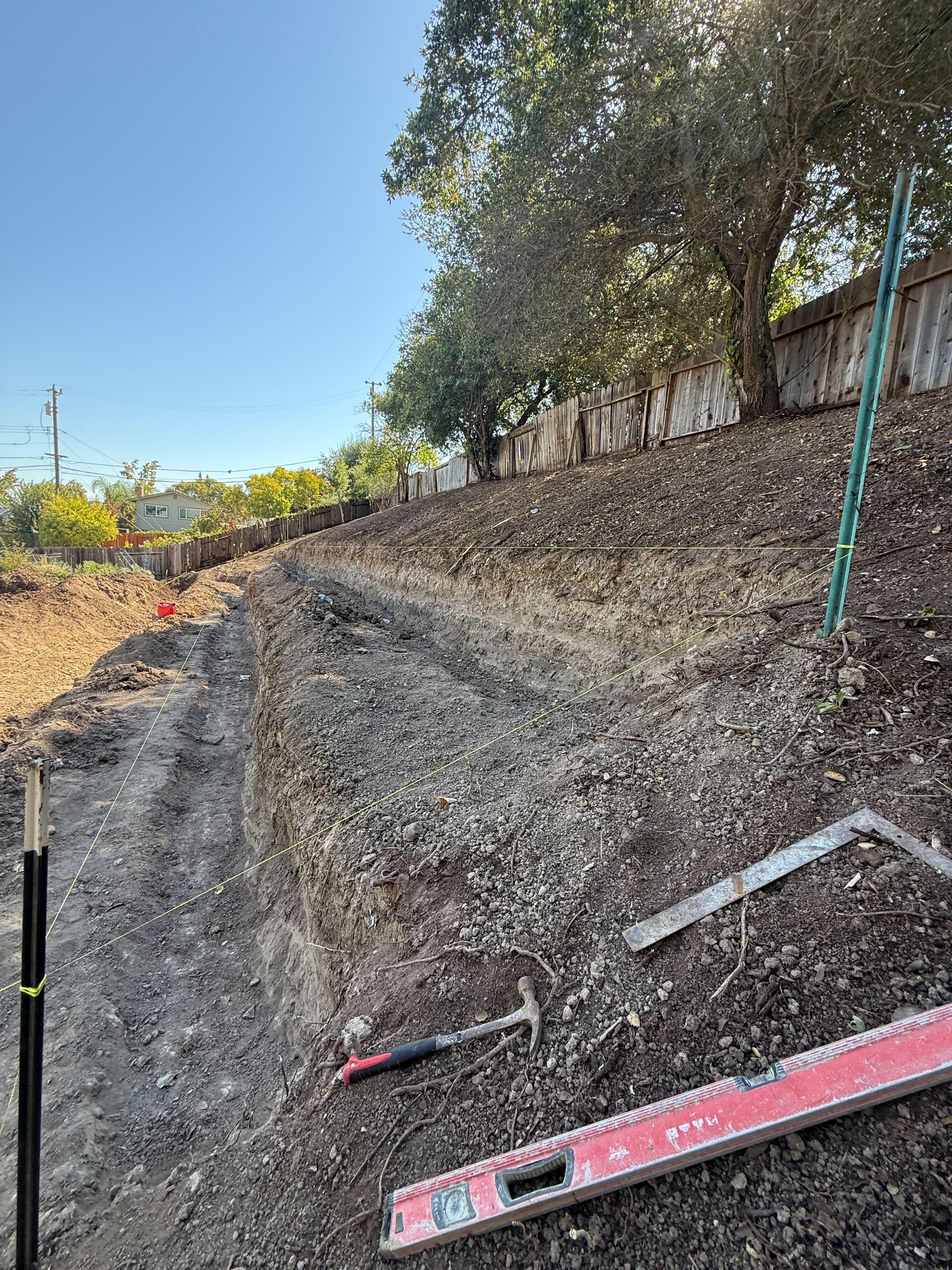 fg-pavers-and-turf-san-jose-retaining-walls-pavers-lighting-progress-41.jpg Hillside wall construction—staging and layout.